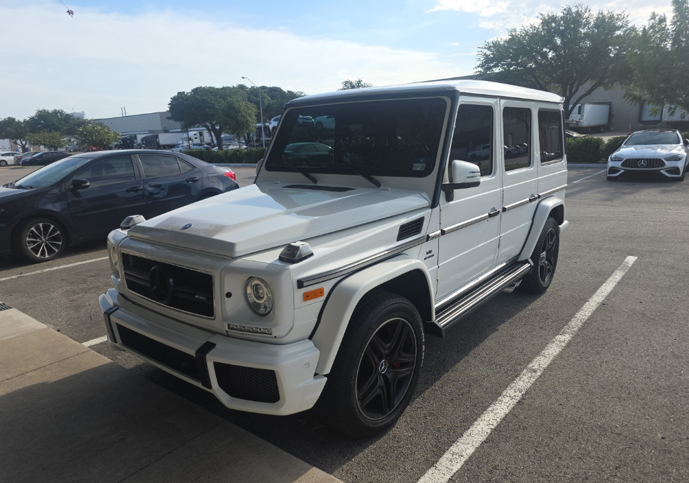 White Mercedes-AMG G63 SUV transported by Allstar Hauling