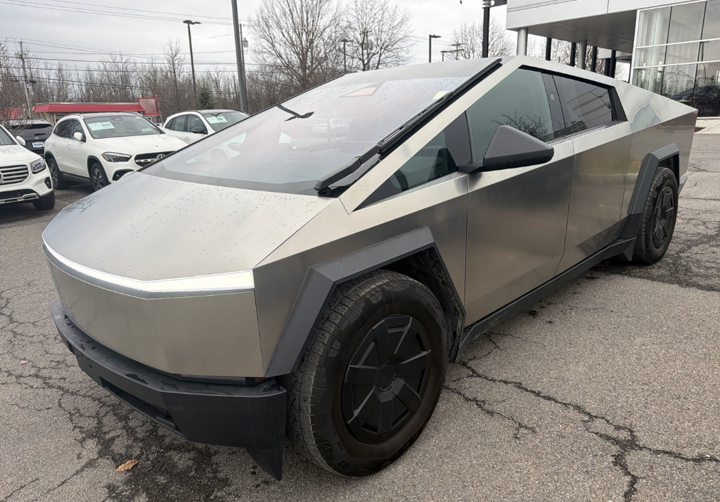Tesla Cybertruck at a dealership before Allstar Hauling transport
