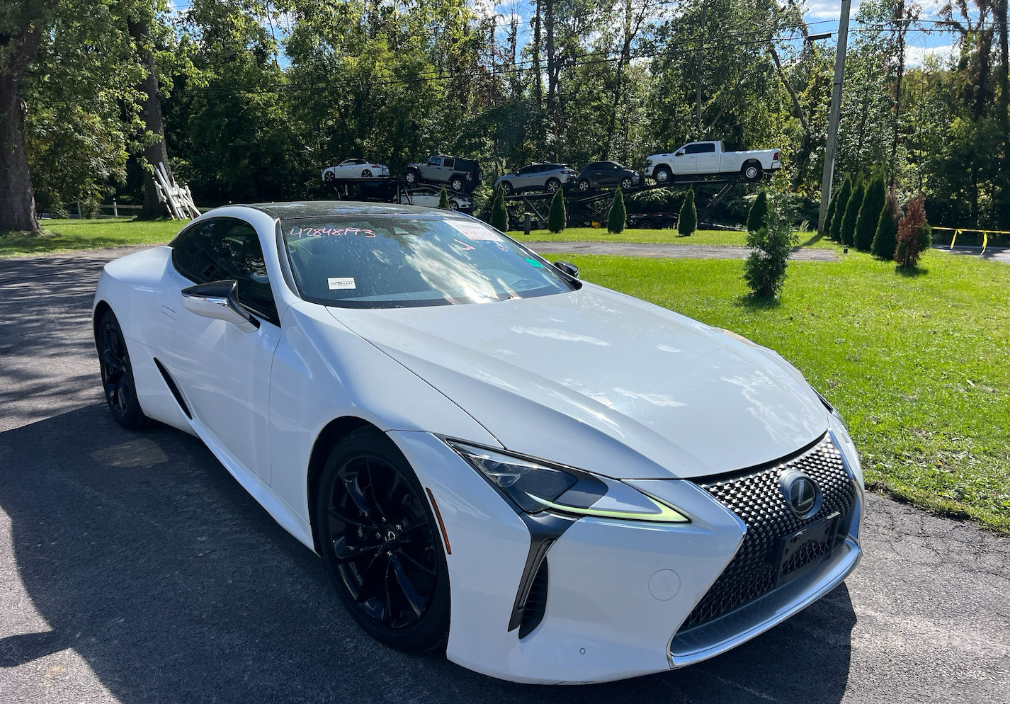 White Lexus LC 500 luxury coupe before Allstar Hauling transport