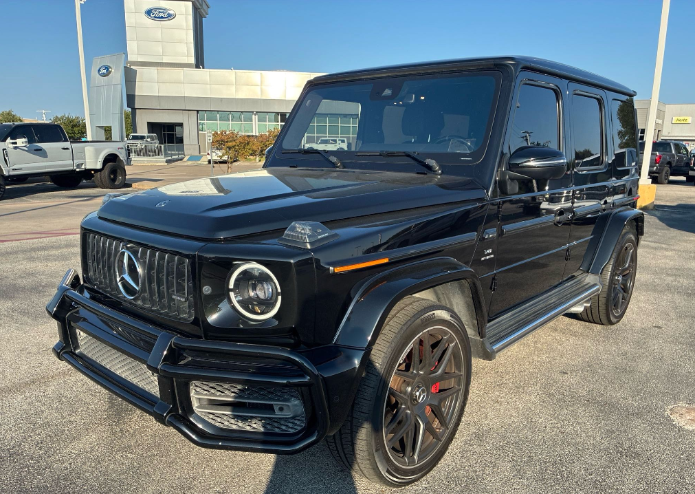 Black Mercedes-AMG G63 SUV transported by Allstar Hauling