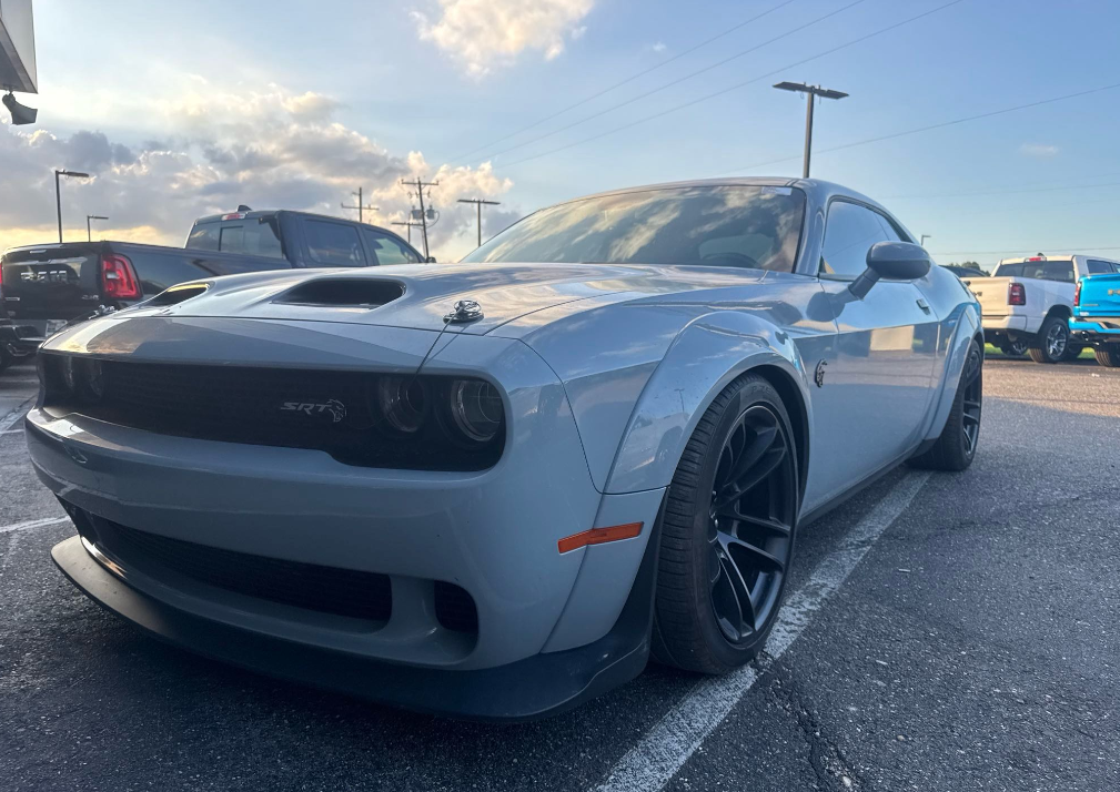 Gray Dodge Challenger SRT Hellcat Widebody hauled by Allstar Hauling