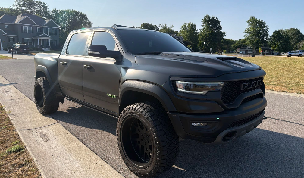Satin black Ram 1500 TRX truck before Allstar Hauling transport