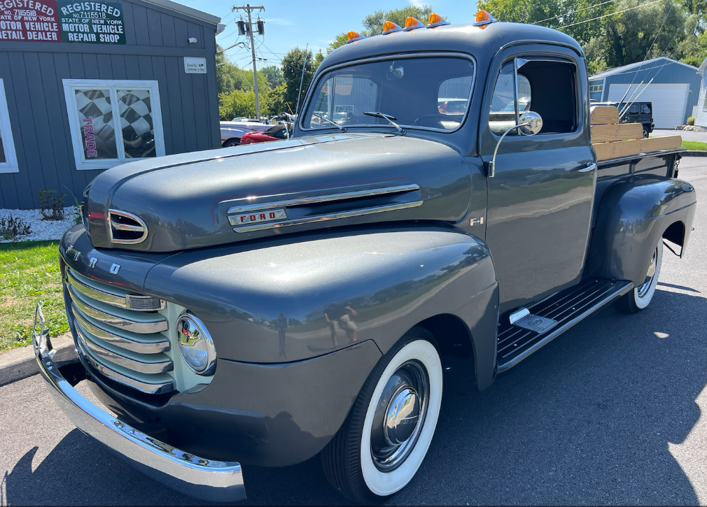 Gray 1950 Ford F-1 classic pickup truck hauled by Allstar Hauling